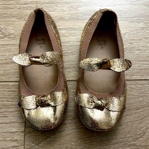 ZARA gold flats with bow detail